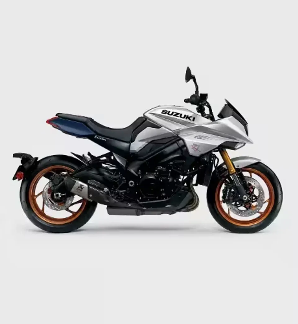 Motocicleta Suzuki Katana plateada con llantas doradas vista de perfil